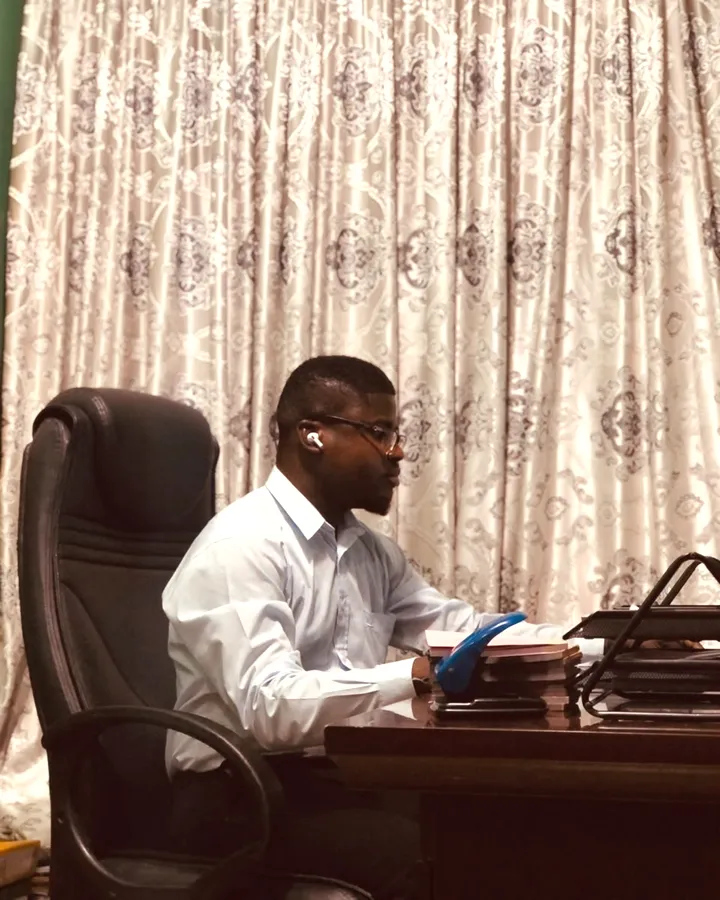 Samuel Otchere, founder of SAMTEC IT SOLUTIONS, at work